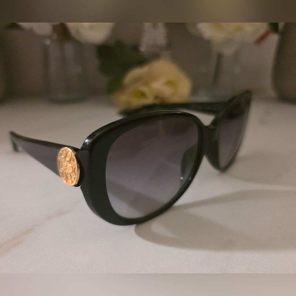 Coach Elegant Black Sunglasses with Gold Accent